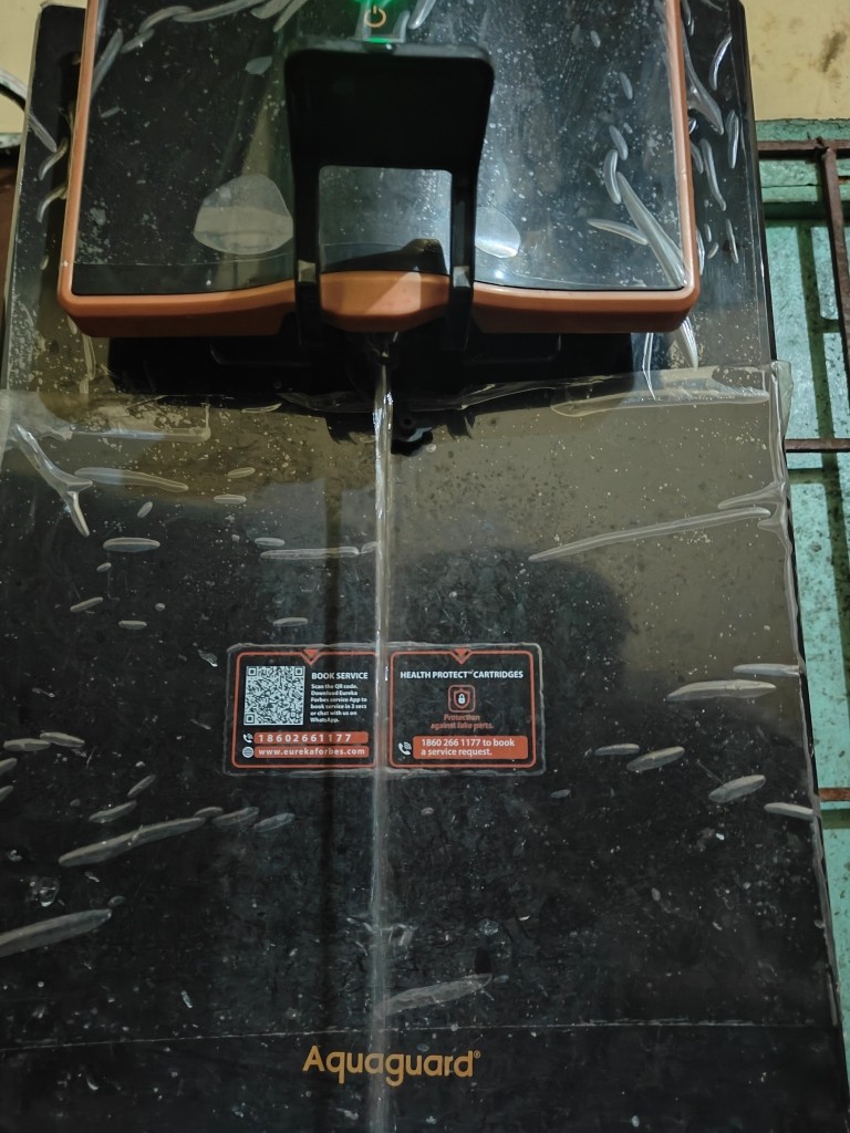 Water flowing from Aquaguard Enrich Marvel tap