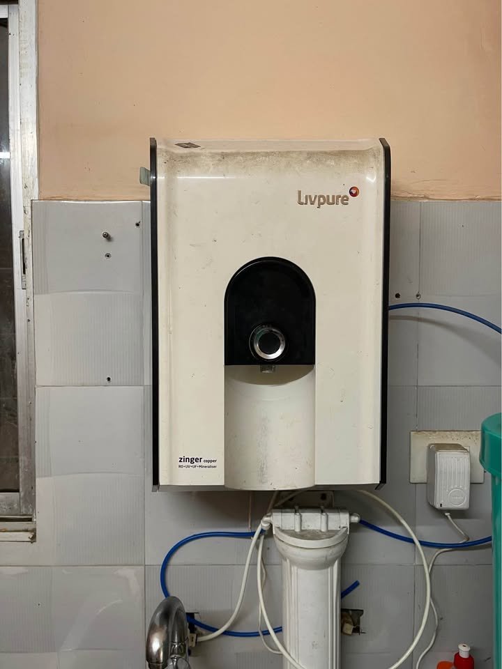 Livpure Zinger Copper RO Water Purifier front view with integrated water dispensing outlet and compact wall-mounted design